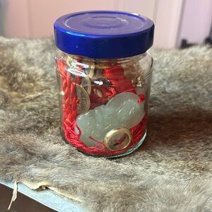 Decorative Jar with Red and Blue Accents